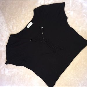Black crop top shirt.